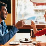interracial-couple-toasting-with-a-cup-of-coffee.jpg