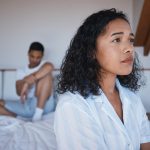 Sad, fight and divorce with couple in bedroom for conflict, frustrated and breakup. Toxic relations